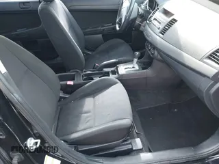 2009 Mitsubishi Lancer DE with VIN JA3AU16U39U000541, listed as a IAAI auction lot 41388897 with 226,951 mi miles. Bid and sale history available at carsss.com. Image 5.