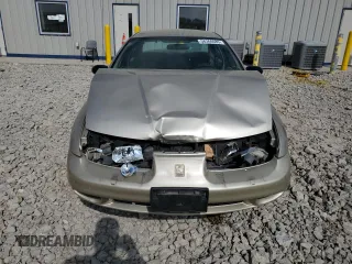 2001 Saturn SL z VIN 1G8ZK52741Z200069, wystawiony jako Copart lot #56360685 z przebiegiem 115 673 mil mil oraz Nie do naprawy. Historia ofert i sprzedaży dostępna na DreamBid. Obrazek 5.