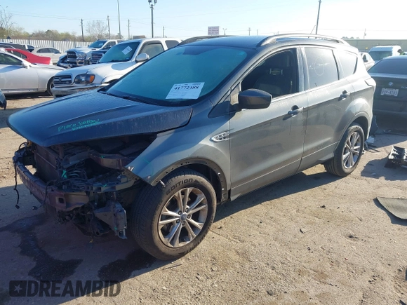 2017 Ford Escape SE z VIN 1FMCU0GD9HUB38906, wystawiony jako IAAI lot #41772488 z przebiegiem 108 259 mil mil oraz . Historia ofert i sprzedaży dostępna na DreamBid. Obrazek 18.