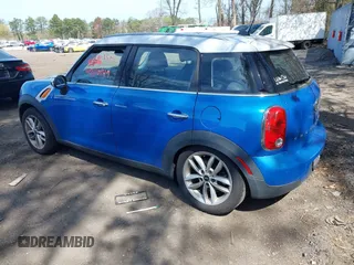 2014 MINI Countryman with VIN WMWZB3C59EWR37439, listed as a IAAI auction lot 42110149 with 181,661 mi miles and . Bid and sale history available at DreamBid. Image 3.