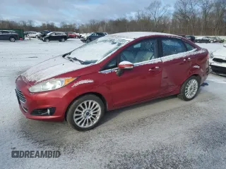 2016 Ford Fiesta Titanium z VIN 3FADP4CJ2GM158152, wystawiony jako Copart lot #82530554 z przebiegiem 61 304 mil mil oraz Szkoda całkowita • Salvage title. Historia ofert i sprzedaży dostępna na DreamBid. Obrazek 1.