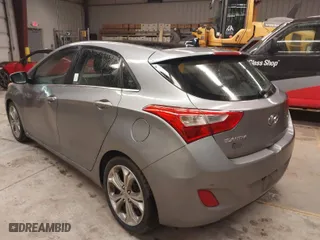 2013 Hyundai Elantra GT with VIN KMHD35LE7DU044309, listed as a IAAI auction lot 41988026 with 128,636 mi miles. Bid and sale history available at carsss.com. Image 3.