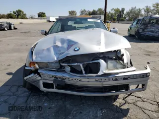 1999 BMW 3 Series 323ic with VIN WBABJ7333XEA17621, listed as a Copart auction lot 71743504 with 108,354 mi miles and Salvage Title. Bid and sale history available at carsss.com. Image 5.