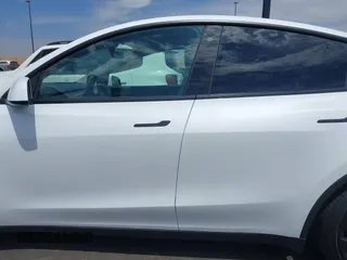 2022 Tesla Model Y Performance with VIN 7SAYGDEF8NF407109, listed as a IAAI auction lot 42014282 with 24,937 mi miles and . Bid and sale history available at DreamBid. Image 14.