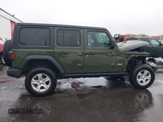 2021 Jeep Wrangler Unlimited Willys with VIN 1C4HJXDN5MW592125, listed as a IAAI auction lot 40821100 with 82,109 mi miles and . Bid and sale history available at DreamBid. Image 13.