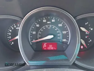 2014 Kia Rio LX with VIN KNADM4A39E6364490, listed as a IAAI auction lot 42128702 with 130,981 mi miles and . Bid and sale history available at DreamBid. Image 7.
