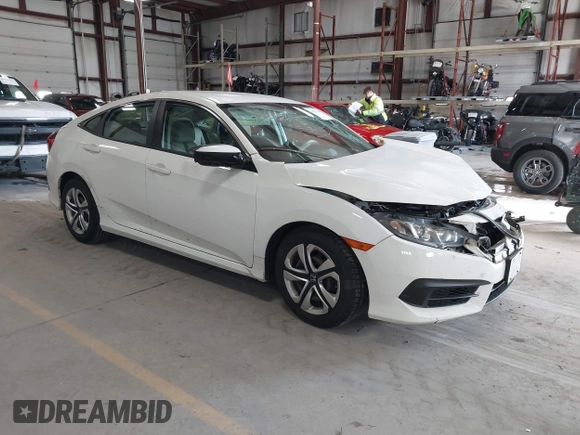 2016 Honda Civic Sedan LX with VIN 19XFC2F59GE028056, listed as a IAAI auction lot 41875940 with 124,243 mi miles. Bid and sale history available at carsss.com. Image 1.