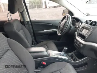 2013 Dodge Journey SE with VIN 3C4PDCAB7DT695493, listed as a IAAI auction lot 42450756 with 153,064 mi miles and . Bid and sale history available at DreamBid. Image 5.