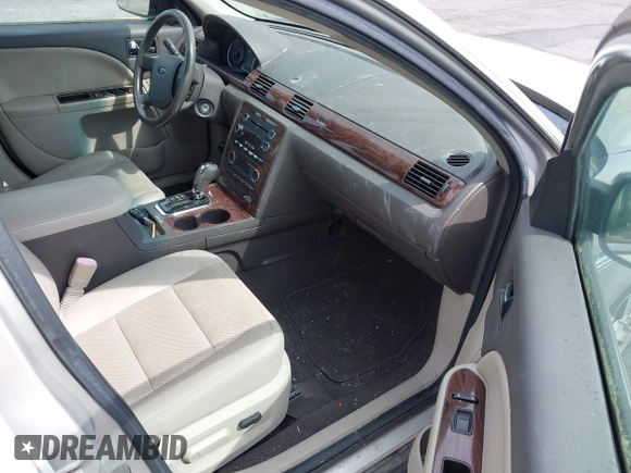 2008 Ford Taurus SEL with VIN 1FAHP24W88G178210, listed as a IAAI auction lot 41933552 with 142,971 mi miles. Bid and sale history available at carsss.com. Image 5.
