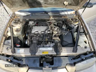 1997 Oldsmobile Cutlass Supreme S z VIN 1G3WH52M8VF352117, wystawiony jako Copart lot #41919094 z przebiegiem 155 523 mil mil oraz Szkody całkowita. Historia ofert i sprzedaży dostępna na DreamBid. Obrazek 11.