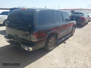 2003 Chevrolet Tahoe LT with VIN 1GNEC13Z43R177798, listed as a IAAI auction lot 41852567 with 298,263 mi miles. Bid and sale history available at carsss.com. Image 4.