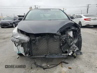 2021 Toyota Prius L Eco z VIN JTDKAMFU2M3148890, wystawiony jako Copart lot #60064065 z przebiegiem 58 226 mil mil oraz Szkoda całkowita • Salvage title. Historia ofert i sprzedaży dostępna na DreamBid. Obrazek 5.