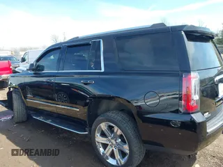 2017 GMC Yukon Denali with VIN 1GKS2CKJ0HR185365, listed as a IAAI auction lot 41856187 with 107,641 mi miles. Bid and sale history available at carsss.com. Image 13.