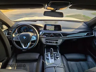 2017 BMW 7 Series 740i with VIN WBA7E2C54HG740427, listed as a Copart auction lot 54992345 with 93,252 mi miles and Clean Title. Bid and sale history available at carsss.com. Image 9.