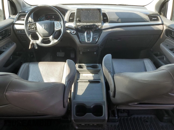 2018 Honda Odyssey Elite with VIN 5FNRL6H9XJB081211, listed as a Copart auction lot 54307325 with 102,364 mi miles and Salvage Title. Bid and sale history available at DreamBid. Image 8.