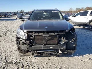 2016 Mercedes-Benz GL with VIN 4JGDF6EE0GA638059, listed as a Copart auction lot 83017144 with 168,505 mi miles and Salvage Title. Bid and sale history available at carsss.com. Image 5.