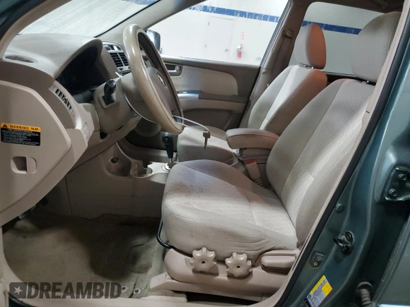 2005 Kia Sportage LX with VIN KNDJE723357136000, listed as a Copart auction lot 78710044 with 219,599 mi miles and Salvage Title. Bid and sale history available at carsss.com. Image 7.