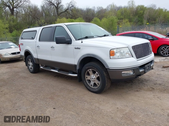 2005 Ford F-150 XLT with VIN 1FTPW14595FA87670, listed as a IAAI auction lot 42157009 with 291,713 mi miles. Bid and sale history available at carsss.com. Image 1.
