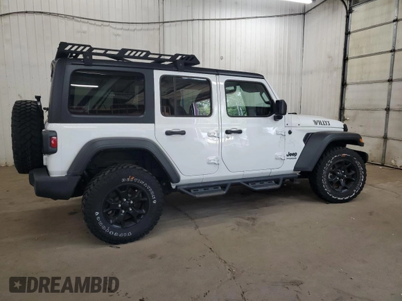 2022 Jeep Wrangler Unlimited Willys with VIN 1C4HJXDM0NW244953, listed as a Copart auction lot 71495154 with 14,577 mi miles and Salvage Title. Bid and sale history available at DreamBid. Image 3.