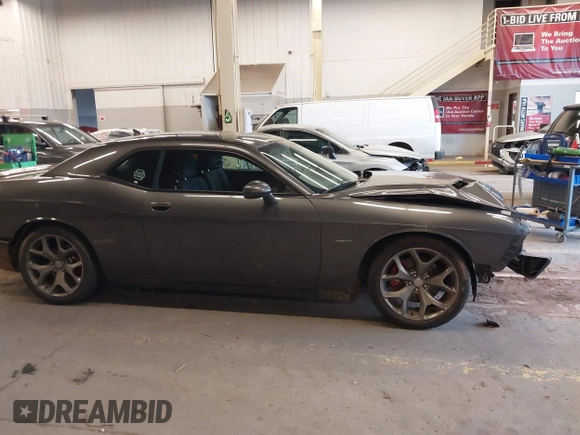 2015 Dodge Challenger R/T with VIN 2C3CDZAT5FH794310, listed as a IAAI auction lot 41725179 with 84,961 mi miles and . Bid and sale history available at DreamBid. Image 14.