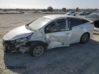 2021 Toyota Prius LE with VIN JTDKAMFP2M3173895, listed as a Copart auction lot 54384825 with 72,915 mi miles and Salvage Title. Bid and sale history available at DreamBid. Image 1.
