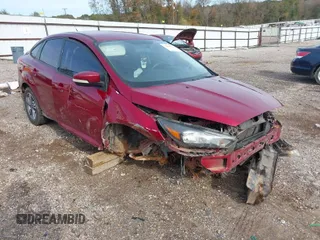 2016 Ford Focus SE with VIN 1FADP3FE6GL208688, listed as a IAAI auction lot 40980789 with 105,954 mi miles. Bid and sale history available at carsss.com. Image 1.