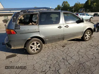1999 Toyota Sienna LE with VIN 4T3ZF13C4XU137126, listed as a Copart auction lot 75205074 with 0 mi miles and Salvage Title. Bid and sale history available at carsss.com. Image 3.