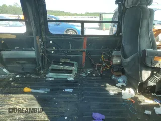 1994 Chevrolet Chevy Van z VIN 1GBEG25K3RF178166, wystawiony jako Copart lot #69173594 z przebiegiem 143 577 mil mil oraz Szkody całkowita. Historia ofert i sprzedaży dostępna na DreamBid. Obrazek 10.