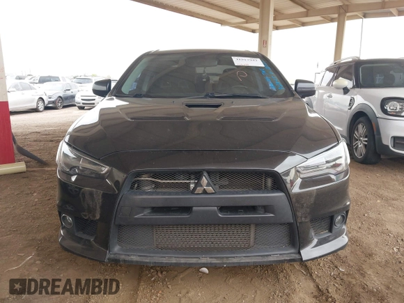 2013 Mitsubishi Lancer Evolution GSR with VIN JA32W8FV6DU009257, listed as a IAAI auction lot 41917942 with 125,279 mi miles. Bid and sale history available at carsss.com. Image 6.
