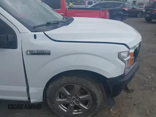 2018 Ford F-150 XL with VIN 1FTEX1EP1JKF66557, listed as a IAAI auction lot 42099567 with 126,516 mi miles and . Bid and sale history available at DreamBid. Image 18.