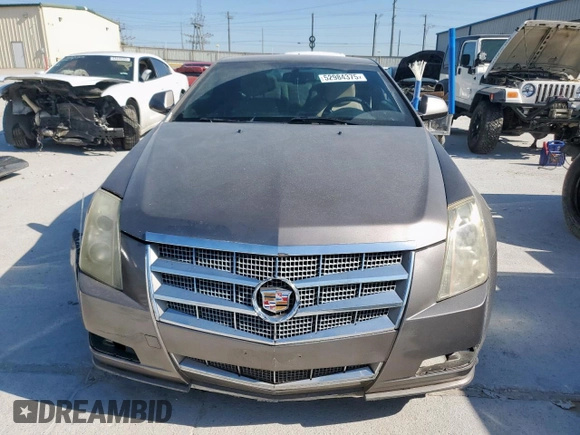 2012 Cadillac CTS Performance z VIN 1G6DJ1E35C0138308, wystawiony jako Copart lot #52984375 z przebiegiem 134 881 mil mil oraz Czysty tytuł • Clean title. Historia ofert i sprzedaży dostępna na DreamBid. Obrazek 5.