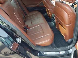 2018 BMW 5 Series M550i xDrive with VIN WBAJB9C50JB036400, listed as a IAAI auction lot 41464278 with 139,079 mi miles and . Bid and sale history available at DreamBid. Image 8.