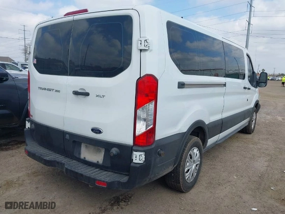 2019 Ford Transit Passenger Wagon XL with VIN 1FBZX2YM5KKA48112, listed as a IAAI auction lot 41518013 with 163,856 mi miles. Bid and sale history available at carsss.com. Image 4.
