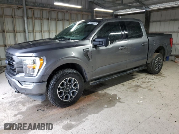 2021 Ford F-150 XL with VIN 1FTFW1E82MFA21318, listed as a Copart auction lot 54409795 with 74,977 mi miles and Salvage Title. Bid and sale history available at carsss.com. Image 1.