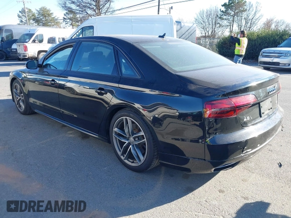 2017 Audi A8 with VIN WAU44AFD0HN017821, listed as a IAAI auction lot 41676097 with 107,378 mi miles and . Bid and sale history available at DreamBid. Image 3.