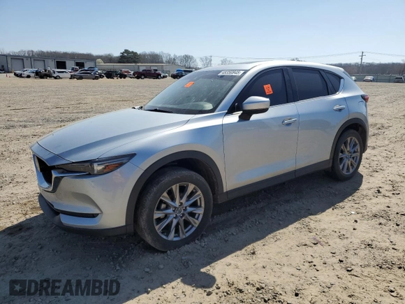 2021 Mazda CX-5 Grand Touring with VIN JM3KFADM6M0387094, listed as a Copart auction lot 48350845 with 94,701 mi miles and Salvage Title. Bid and sale history available at carsss.com. Image 1.