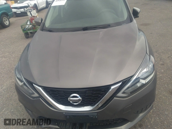 2016 Nissan Sentra S with VIN 3N1AB7AP3GL648029, listed as a IAAI auction lot 36926968 with 122,251 mi miles and . Bid and sale history available at DreamBid. Image 6.