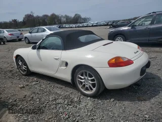 2000 Porsche Boxster z VIN WP0CA2983YU620313, wystawiony jako Copart lot #54605995 z przebiegiem 134 807 mil mil oraz Tytuł czysty. Historia ofert i sprzedaży dostępna na DreamBid. Obrazek 2.