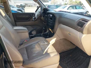 2000 Toyota Land Cruiser with VIN JT3HT05J3Y0098534, listed as a IAAI auction lot 41054858 with 336,520 mi miles. Bid and sale history available at carsss.com. Image 5.