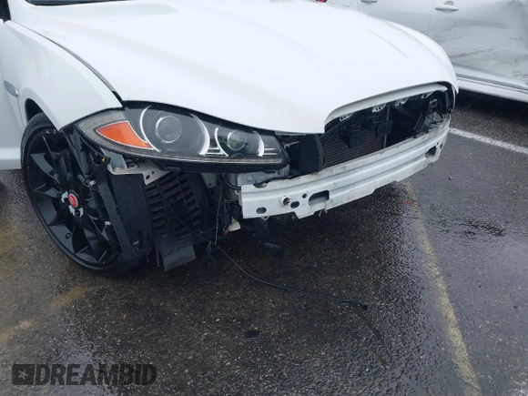 2015 Jaguar XF V6 Portfolio with VIN SAJWA0F70F8U62534, listed as a IAAI auction lot 41521097 with 112,117 mi miles. Bid and sale history available at carsss.com. Image 6.