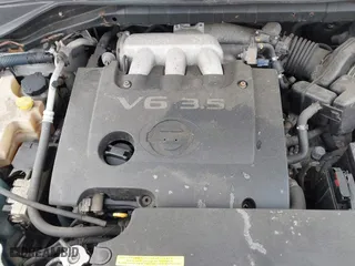 2004 Nissan Murano SL with VIN JN8AZ08T04W221811, listed as a IAAI auction lot 41551179 with 999,999 mi miles. Bid and sale history available at carsss.com. Image 10.