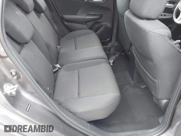 2018 Honda Fit EX with VIN 3HGGK5H85JM704873, listed as a IAAI auction lot 42421049 with 58,481 mi miles and . Bid and sale history available at DreamBid. Image 8.