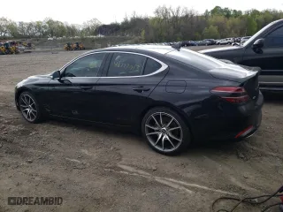 2022 Genesis G70 2.0T with VIN KMTG34TA0NU103227, listed as a Copart auction lot 48777013 with 15,901 mi miles. Bid and sale history available at carsss.com. Image 2.