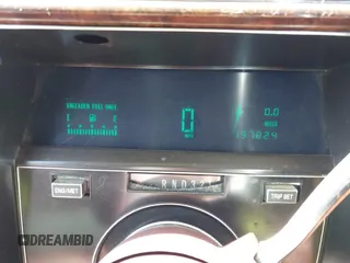 1991 Cadillac Brougham z VIN 1G6DW54E4MR716777, wystawiony jako IAAI lot #42383965 z przebiegiem 197 824 mil mil oraz . Historia ofert i sprzedaży dostępna na DreamBid. Obrazek 7.