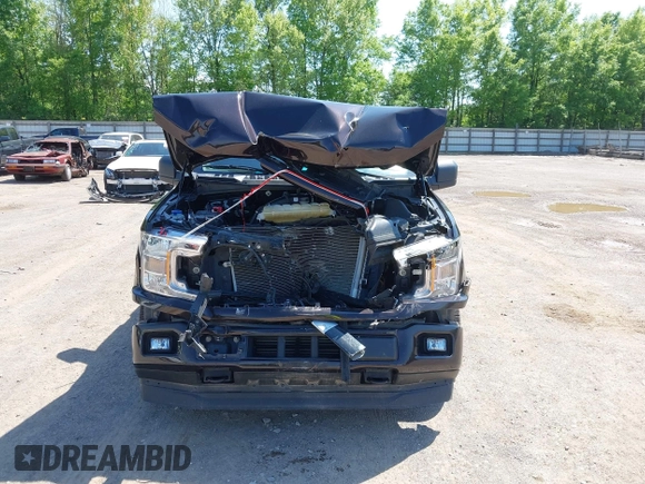 2020 Ford F-150 XL with VIN 1FTEW1EP3LFC56067, listed as a IAAI auction lot 42132791 with 103,357 mi miles and . Bid and sale history available at DreamBid. Image 12.