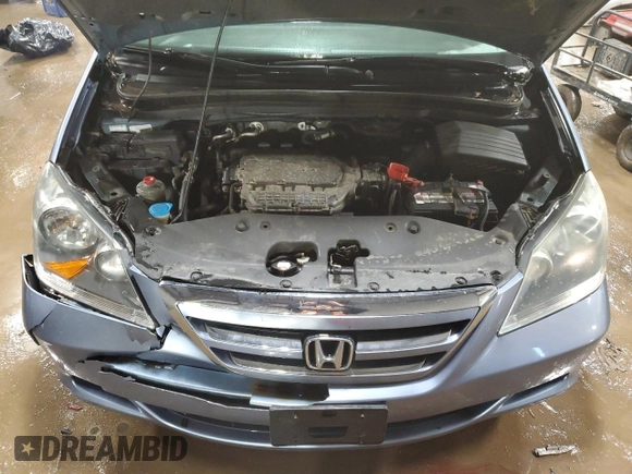 2005 Honda Odyssey EX-L with VIN 5FNRL38725B097759, listed as a Copart auction lot 49485295 with 199,008 mi miles and Salvage title. Bid and sale history available at DreamBid. Image 12.