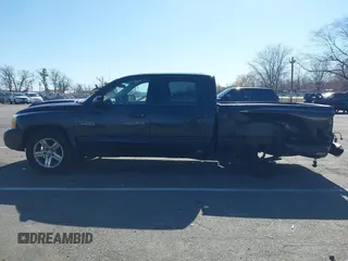 2007 Dodge Dakota SLT z VIN 1D7HW48JX7S196121, wystawiony jako IAAI lot #41863734 z przebiegiem 148 720 mil mil oraz . Historia ofert i sprzedaży dostępna na DreamBid. Obrazek 14.
