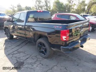 2018 Chevrolet Silverado 1500 Work Truck with VIN 1GCVKNEH3JZ247828, listed as a IAAI auction lot 41537573 with 134,684 mi miles. Bid and sale history available at carsss.com. Image 3.