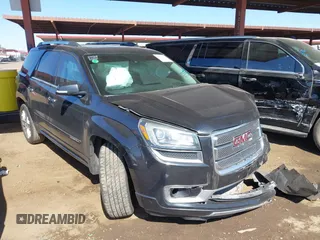 2014 GMC Acadia Denali with VIN 1GKKRTKD0EJ173975, listed as a IAAI auction lot 41615302 with 147,169 mi miles. Bid and sale history available at carsss.com. Image 1.