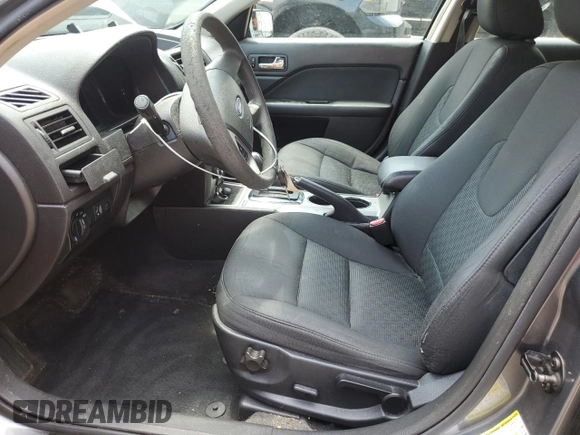 2010 Ford Fusion SE with VIN 3FAHP0HA4AR387638, listed as a Copart auction lot 60649585 with 210,779 mi miles and Salvage title. Bid and sale history available at DreamBid. Image 7.